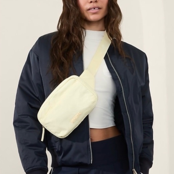 Athleta Handbags - Athleta All About Large Crossbody Belt Bag Glow light yellow butter